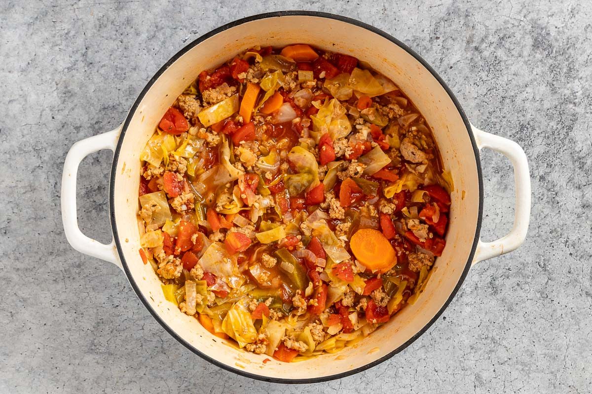 Taste of Home Cabbage Stew recipe photo of the fully cooked stew in the Dutch oven.