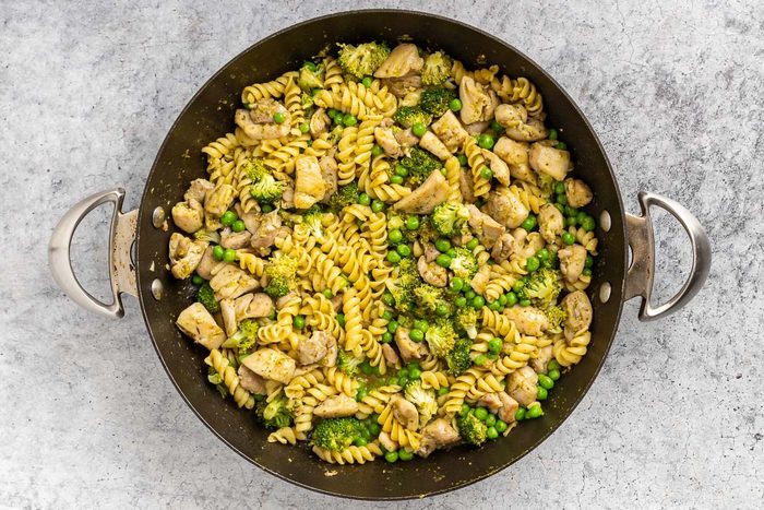 Taste of Home Chicken Pesto Pasta recipe photo of the rest of the ingredients added to the skillet and cooked to serve.