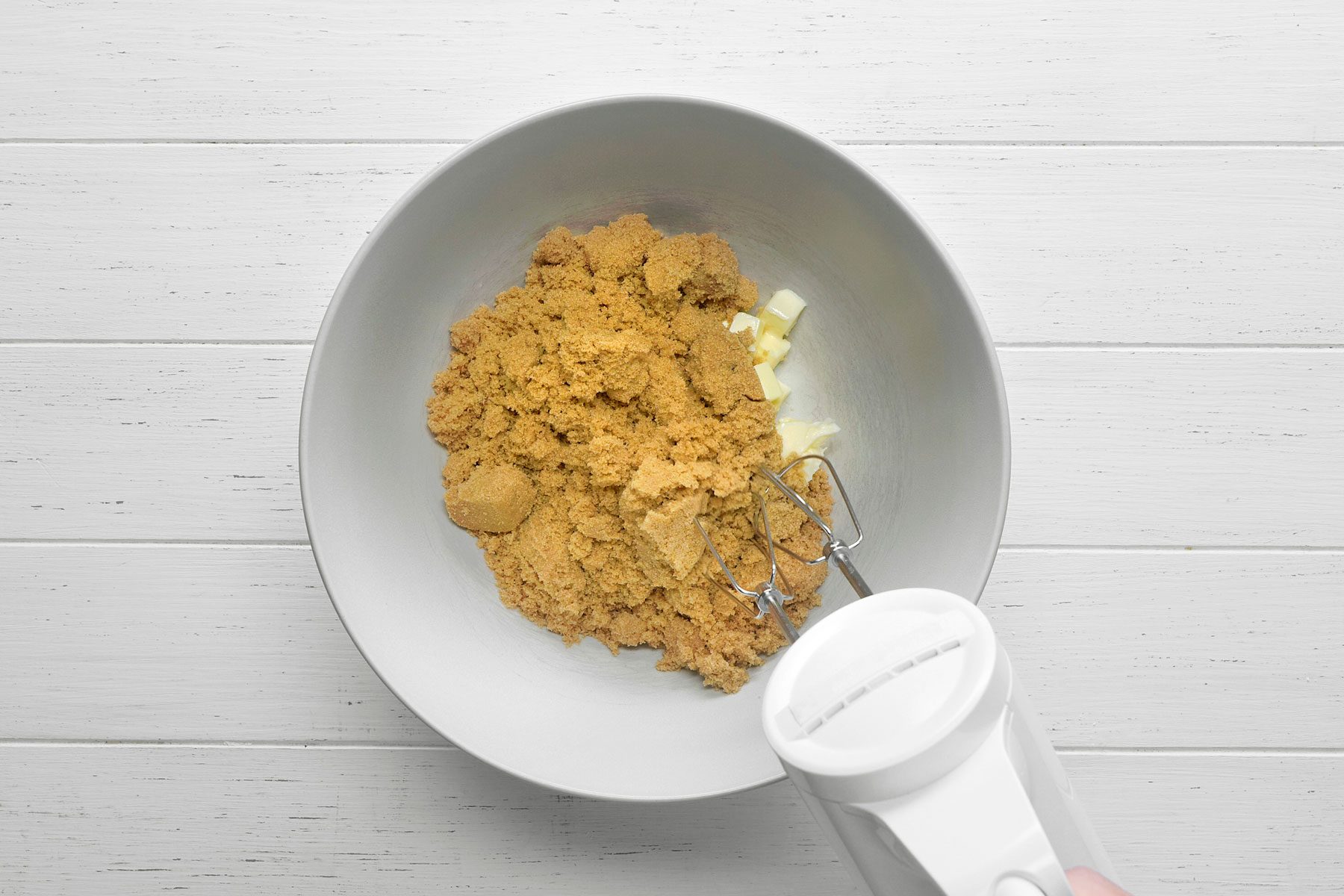 Butter and brown sugar creamed in a large bowl.