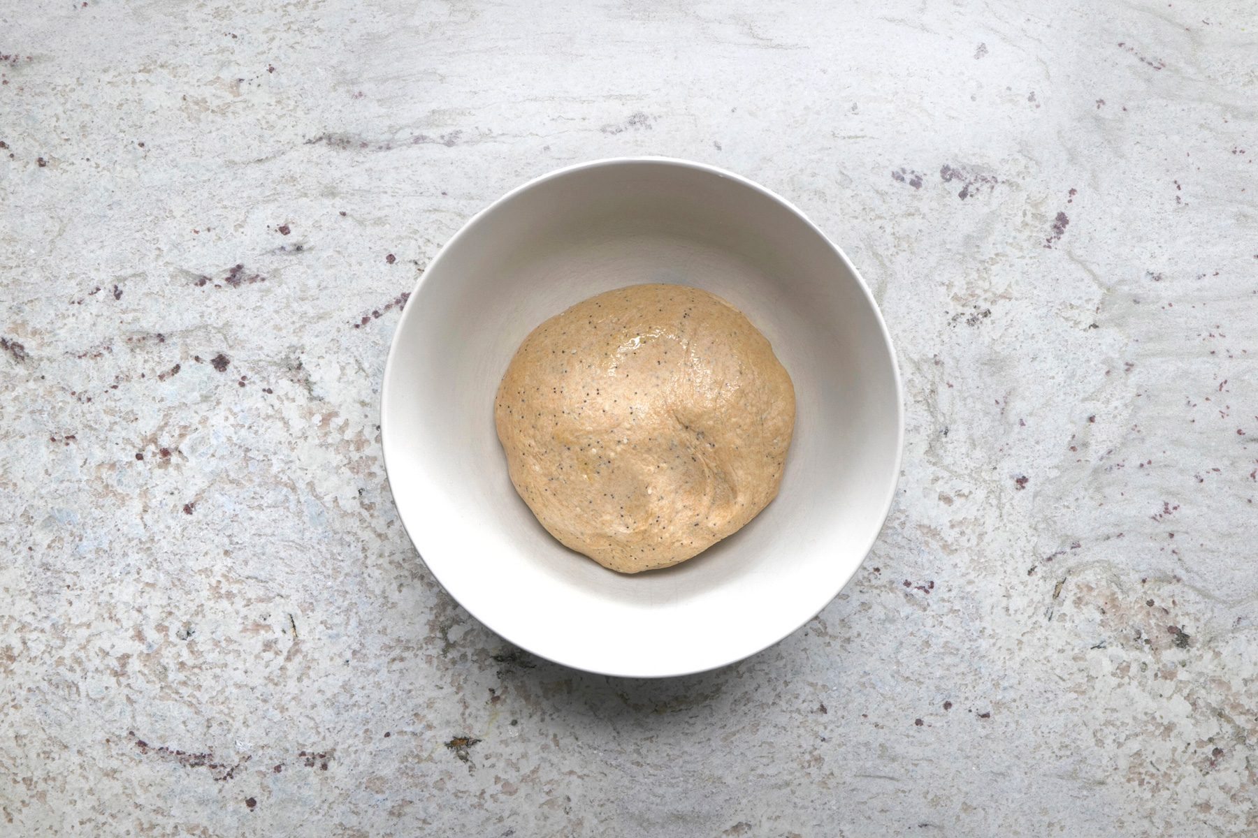 Place in a greased bowl, turning once to grease top.