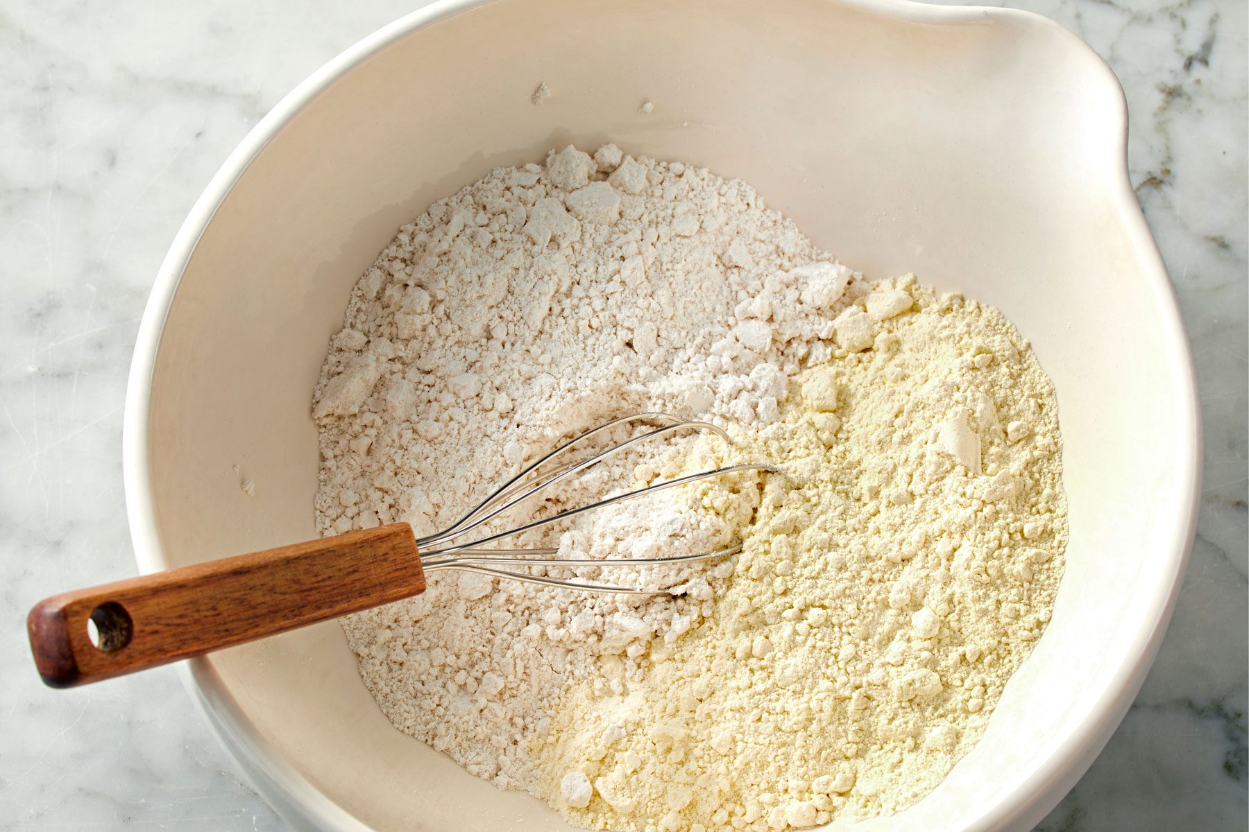 pancake mix and cake mix whisked together in a large bowl.