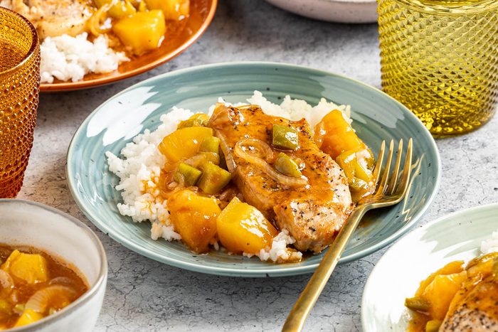 Taste of Home Hawaiian Pork Chops photo of the finished recipe served on plates.