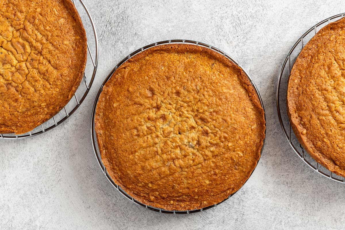 Taste of Home Italian Cream Cake recipe photo of the baked cakes on a cooling rack.