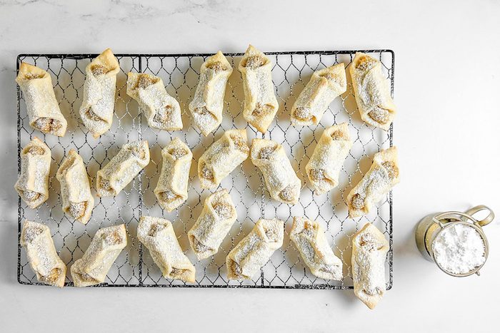 Taste of Home Kolacky Cookies on a wire rack on a marble surface