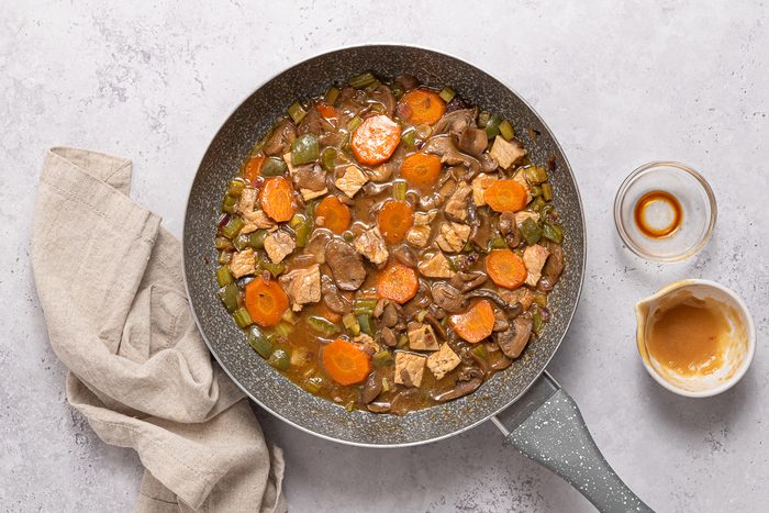 Pan With Cooked Vegetables And Leftover Pork