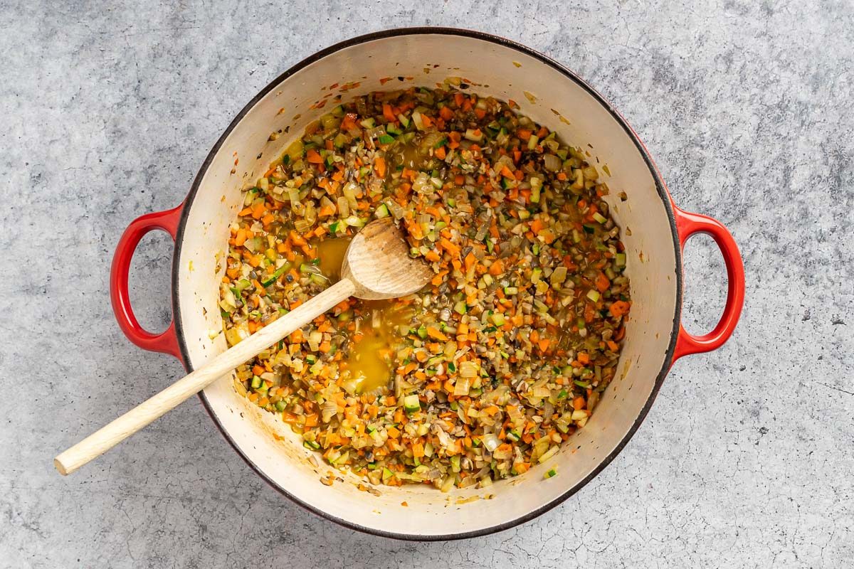 Taste of Home Mushroom Bolognese recipe photo of degalzing with wine or chicken broth.