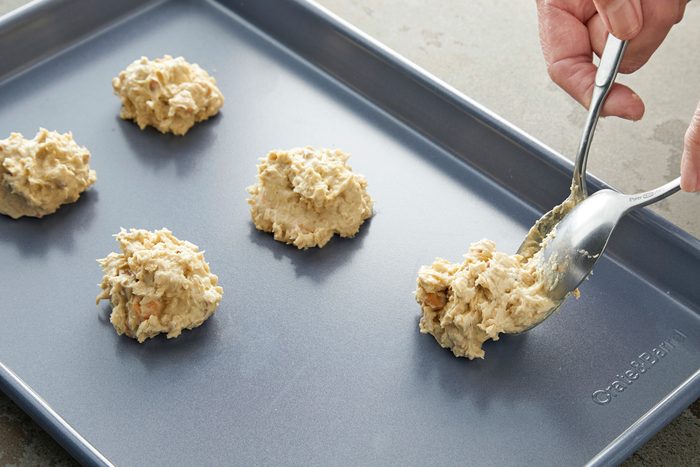 Cookie dough dropped by the tablespoonfuls 3 inches apart onto ungreased baking sheets.