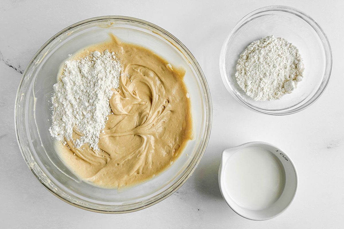 Ingredients for Taste of Home Peanut Butter Cake on a marble surface