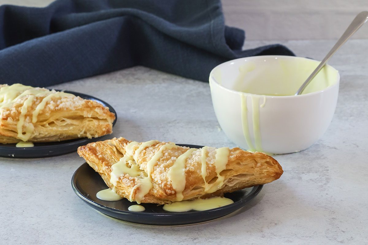 Powdered sugar glaze from Taste of Home, shown on apple pastries.
