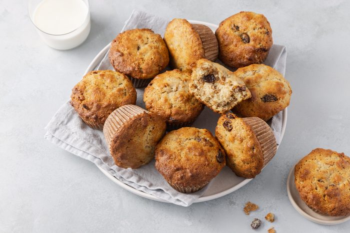 Muffins ready served on plate with inside showing.