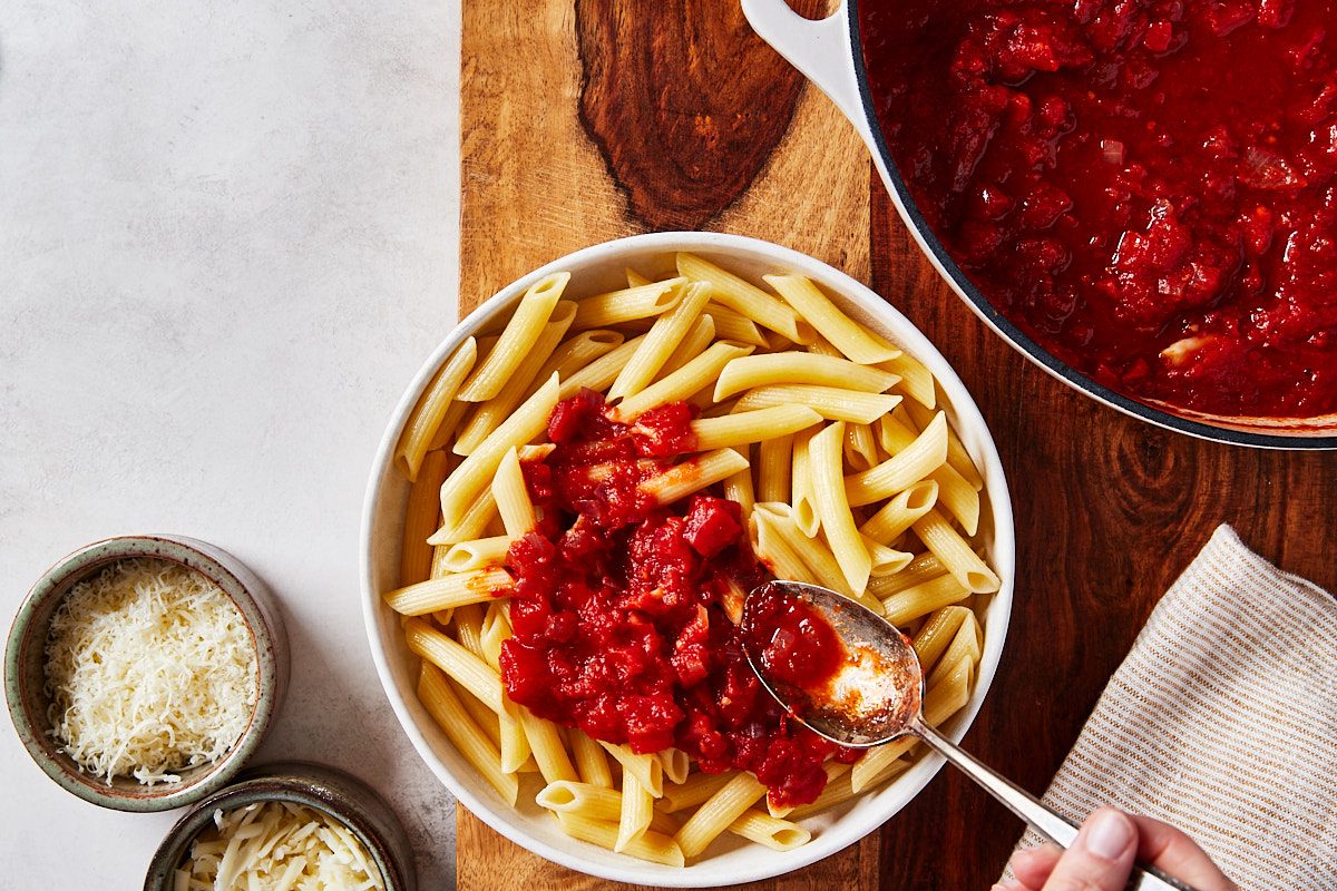 Red Wine Pasta Step 3- spooning sauce onto pasta