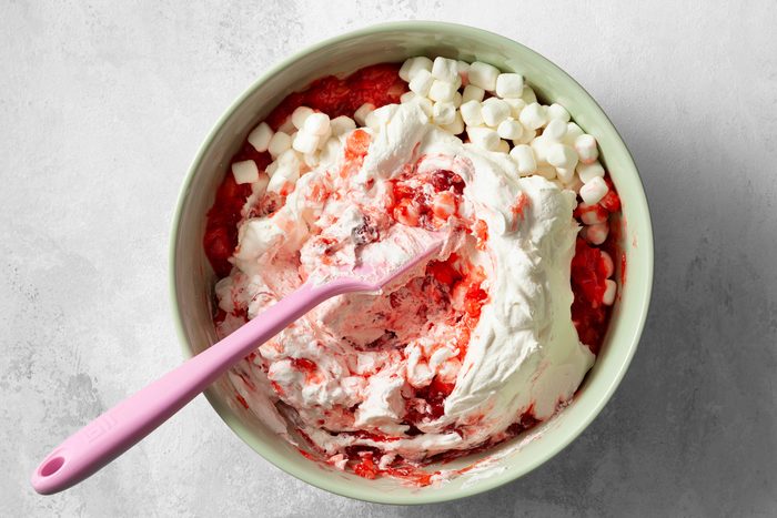 Fold in miniature marshmallows and whipped topping.