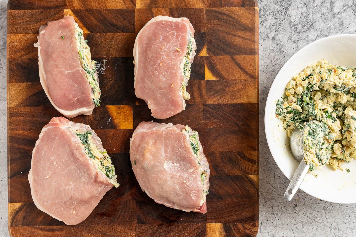 Taste of Home Stuffed Pork Chops photo of the pork chops stuffed with the filling.