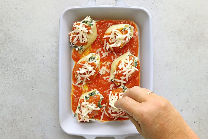 Arrange in prepared dish. Top with remaining spaghetti sauce and mozzarella.