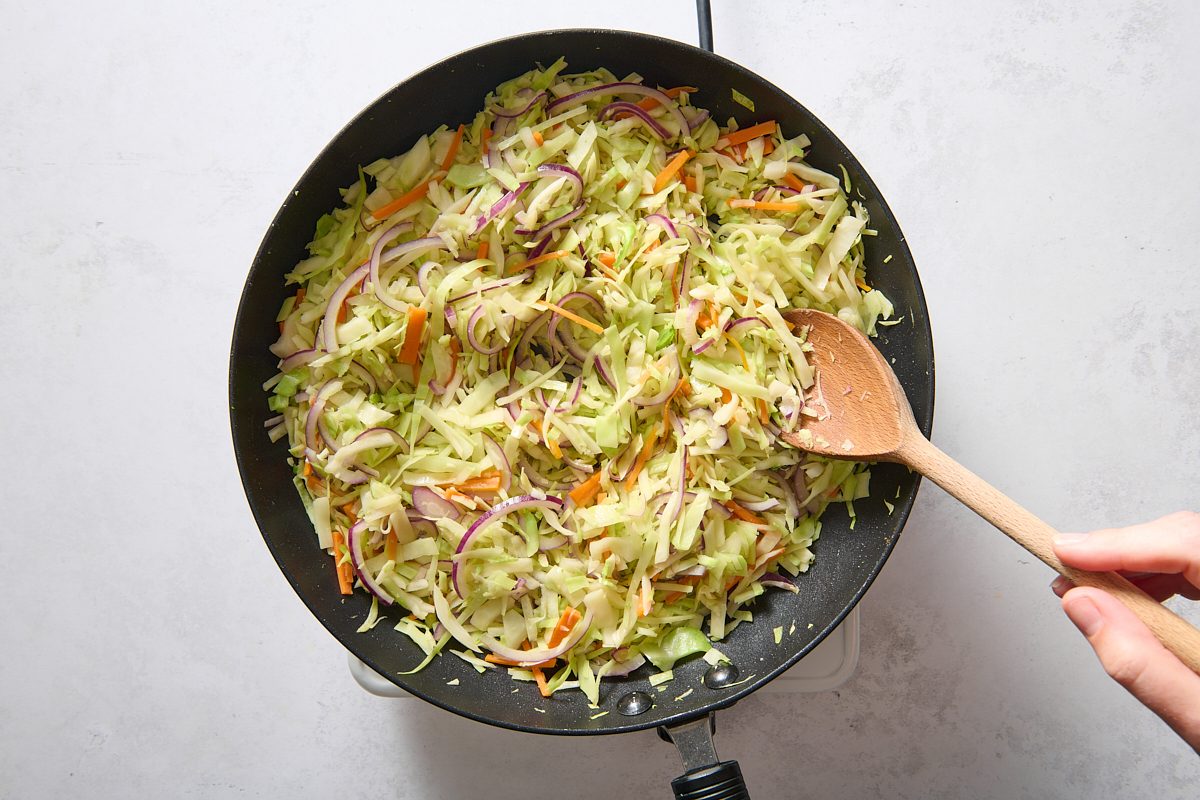 Stir frying the vegetables in a large skillet
