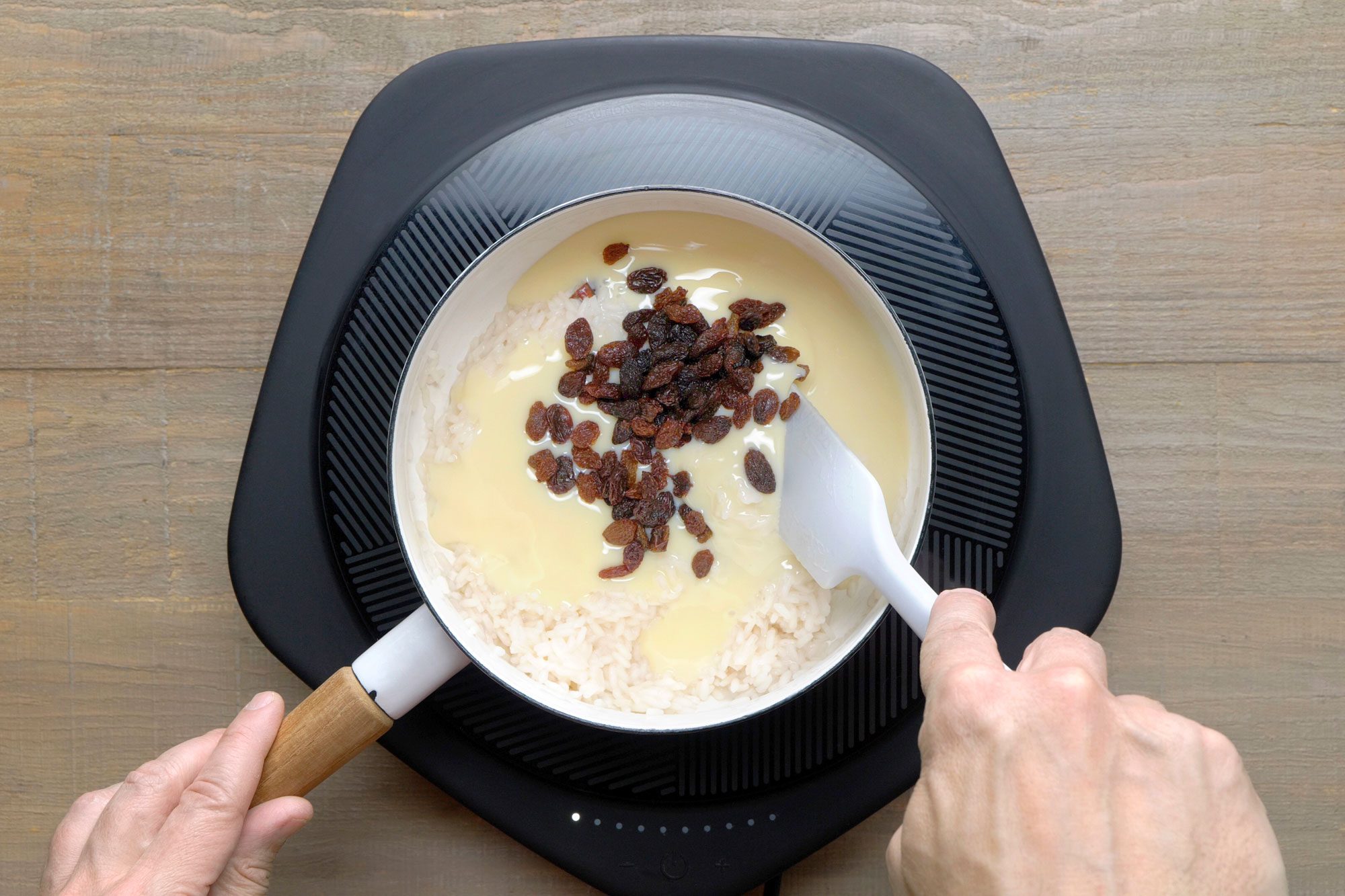 raisins and creamy mixture on the rice