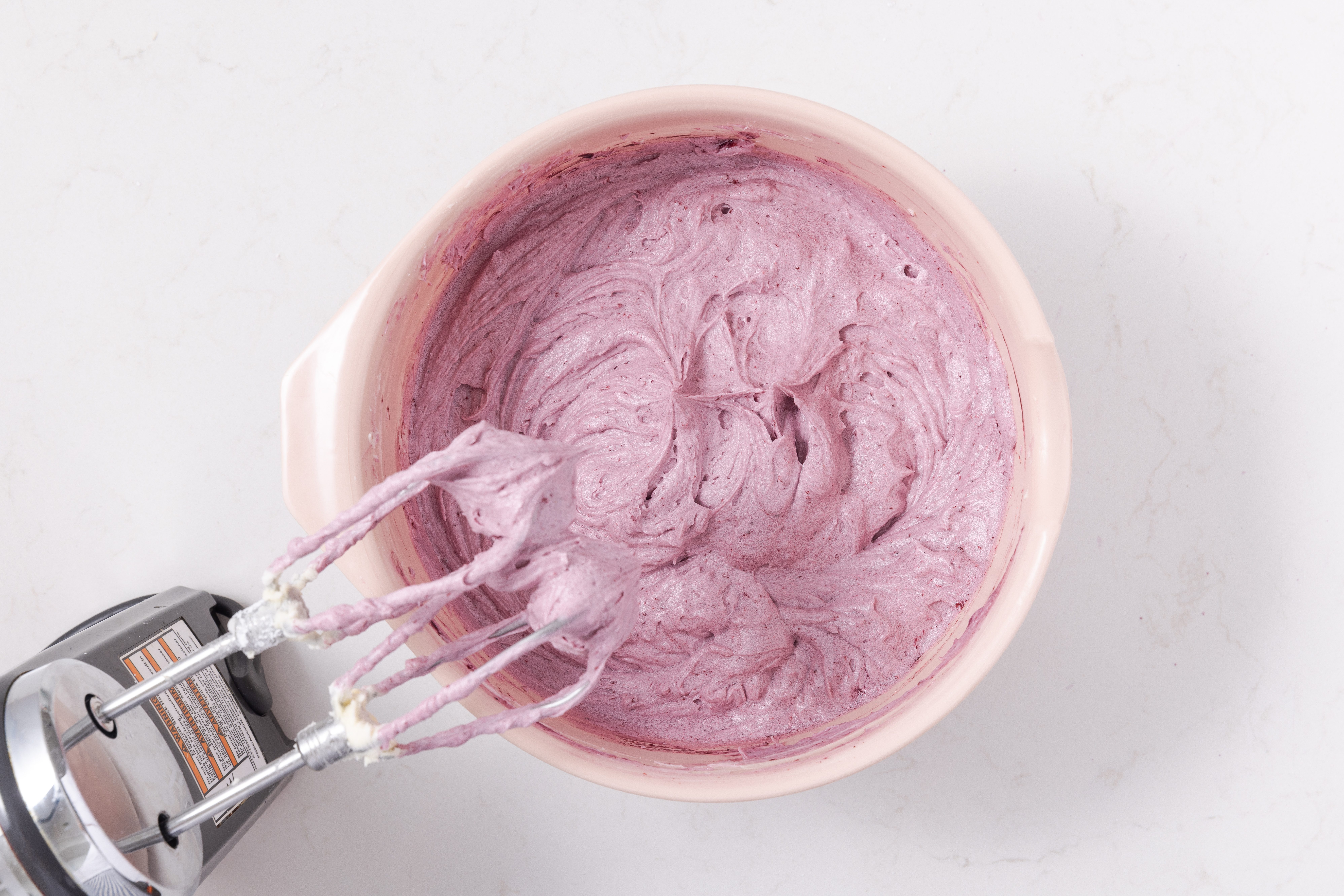 Blackberry puree beaten with butter and sugar mixture.