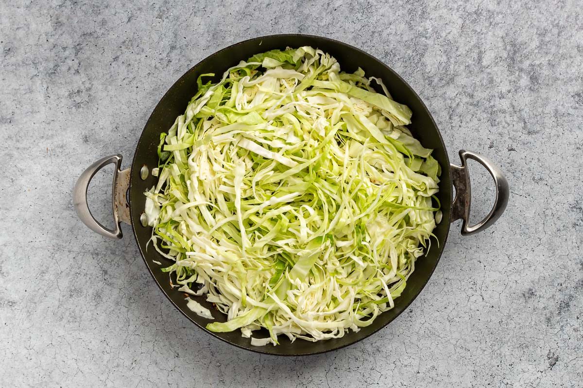 cabbage added to the skillet with 3 tablesppons of reserve bacon fat.
