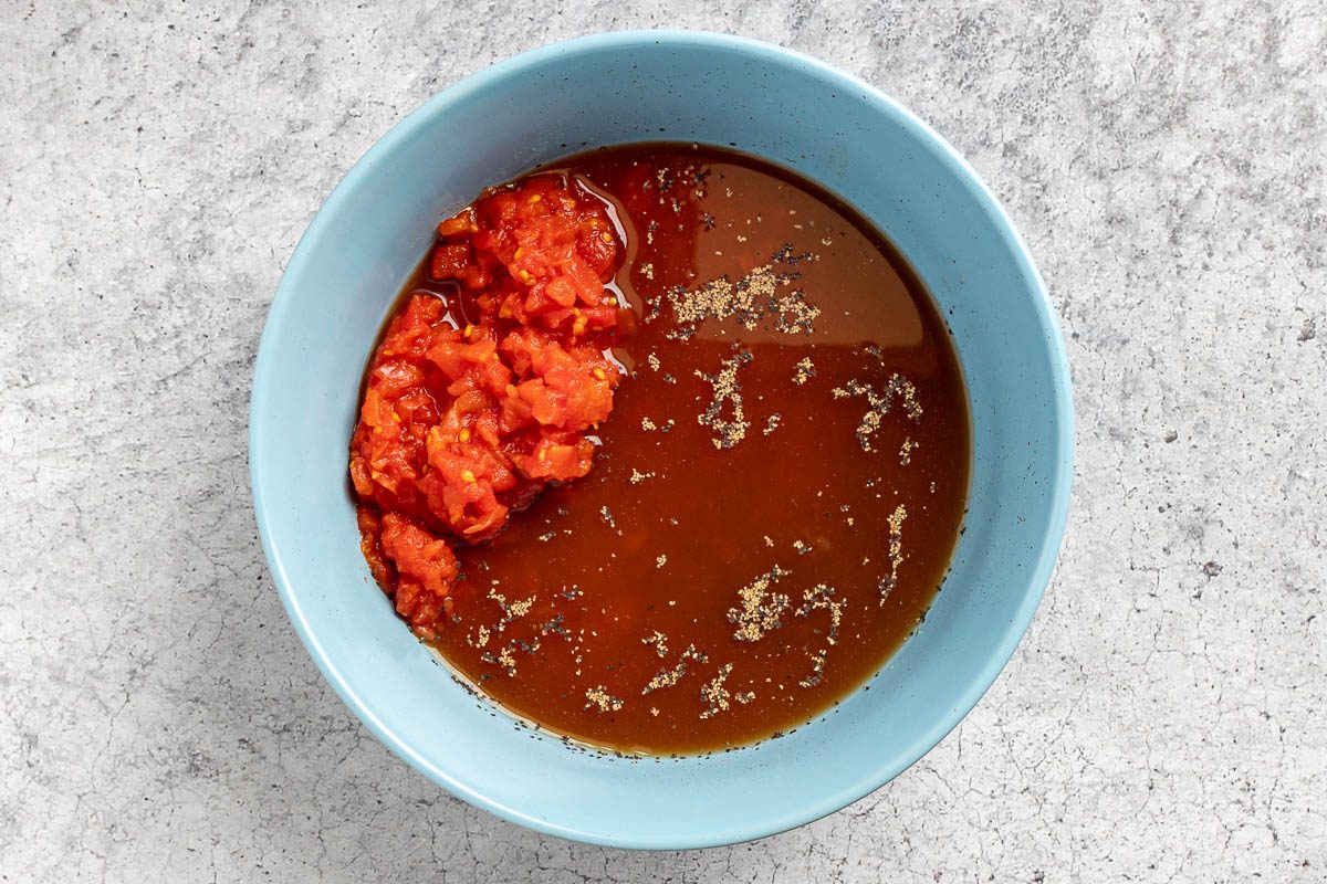 combining the liquids and seasonings.