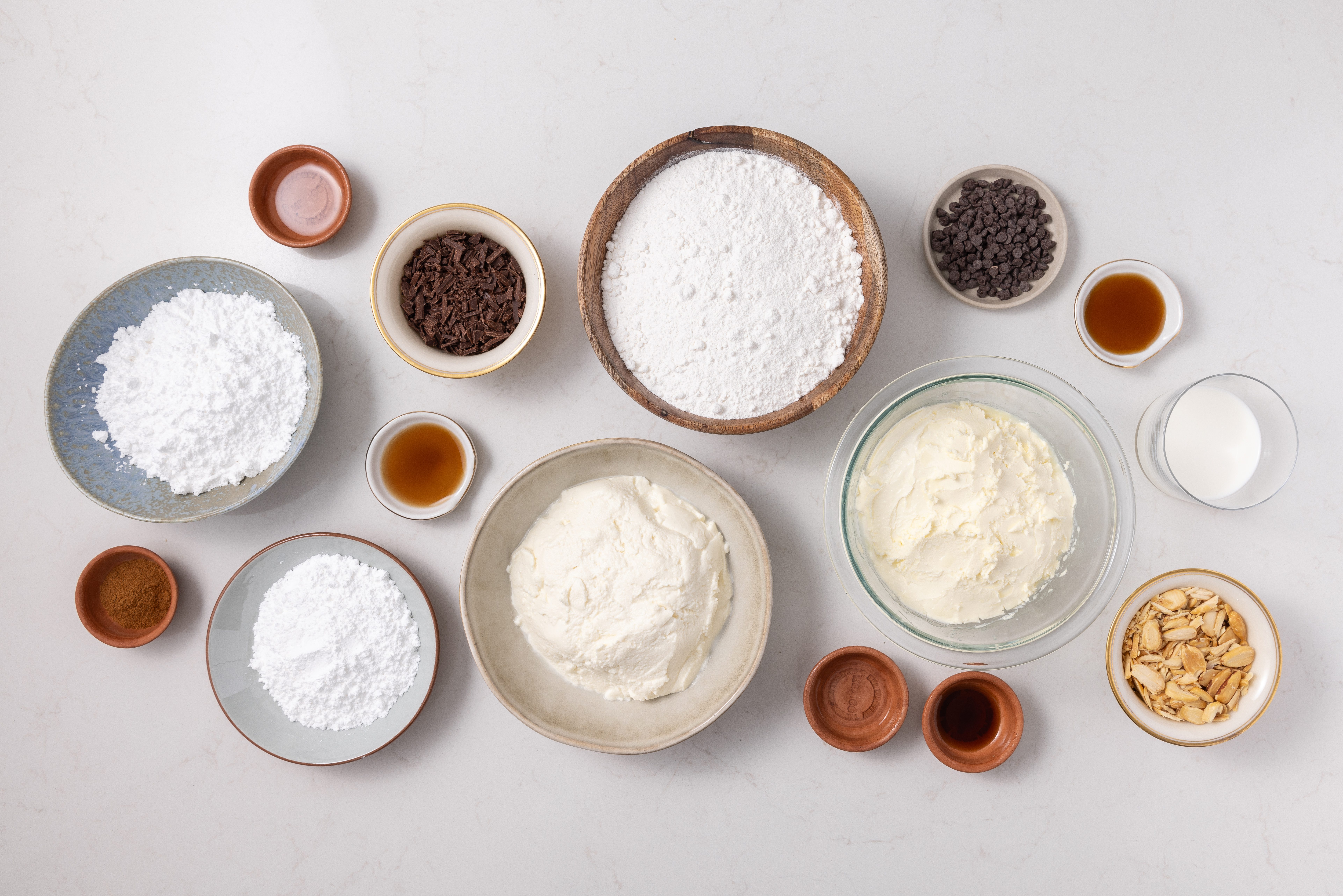 Ingredients for cannoli cake on kitchen counter.