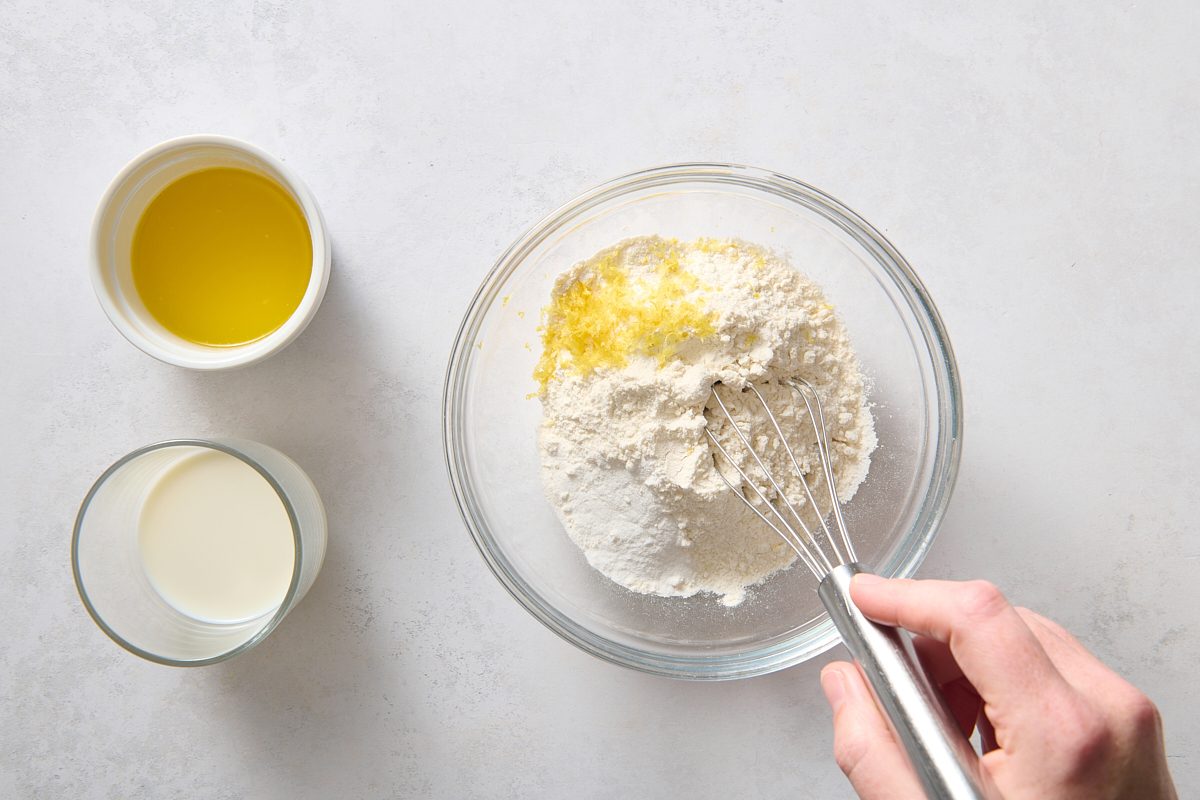 Whisking the dumpling batter ingredients