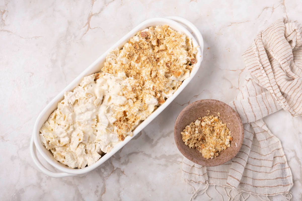 Chicken Artichoke Casserole getting ready to be baked