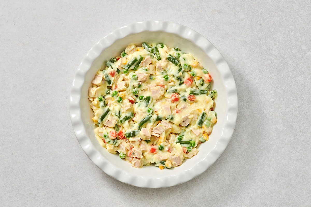 Pot pie filling in a pie dish