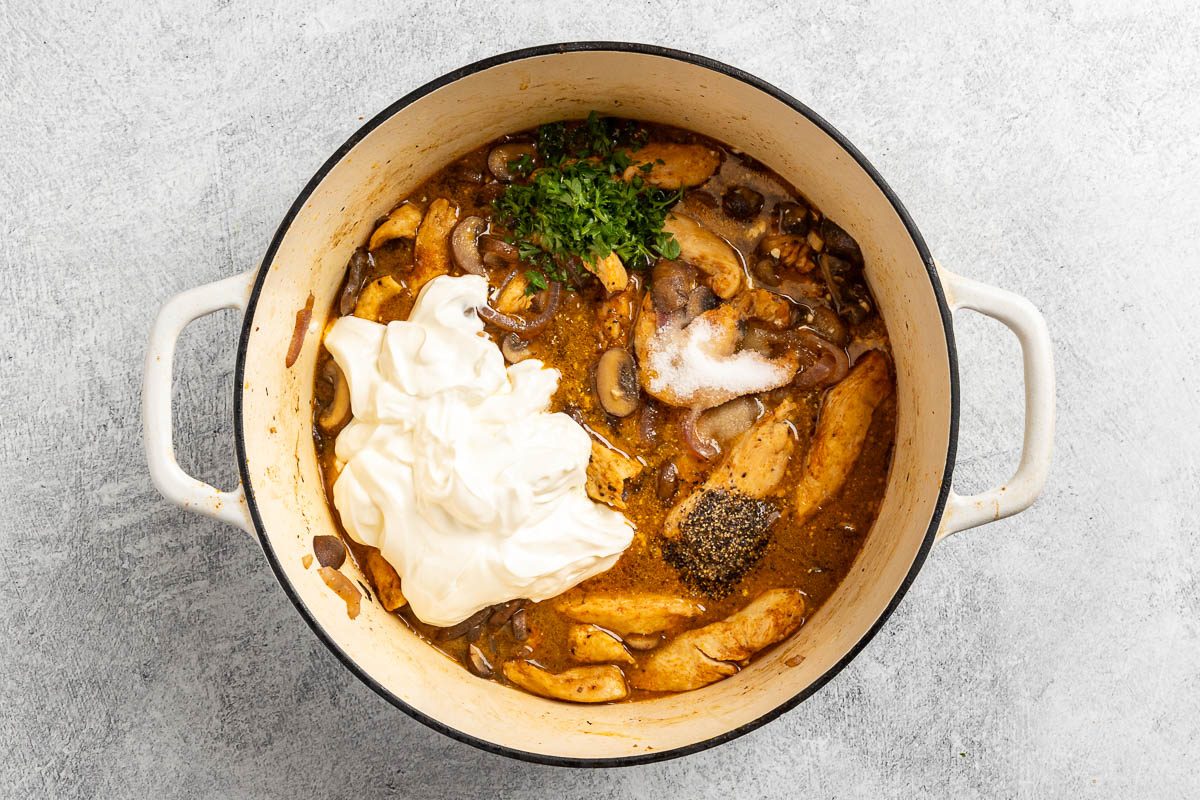 creme fraiche, parsley, and remaining salt and pepper added to the Dutch oven.
