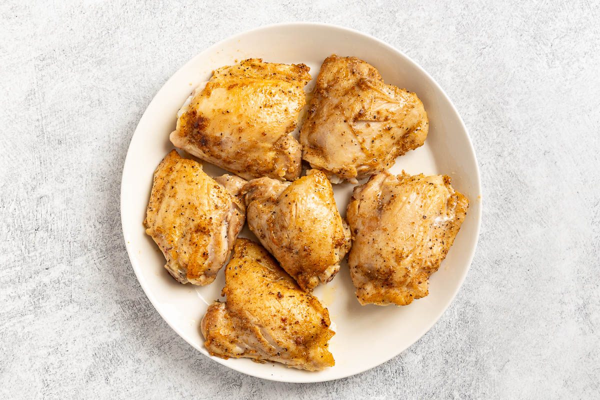 Taste of Home Chicken and Andouille Gumbo photo of the seasoned and browned chicken thighs.