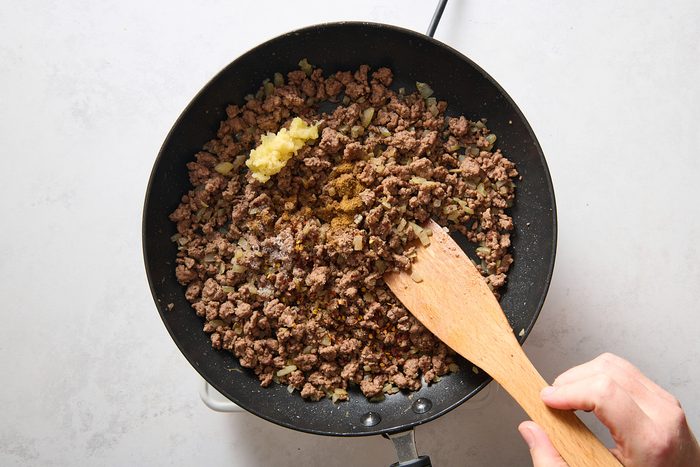 Cooking the ground beef in a skillet