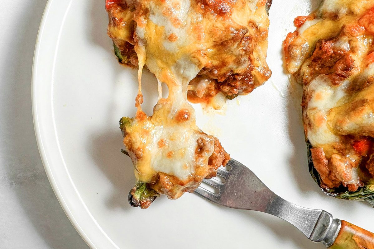 Taste of Home Chili Stuffed Poblano Peppers on a white plate