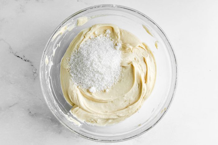 Batter for Taste of Home Coconut Pound Cake in a glass bowl