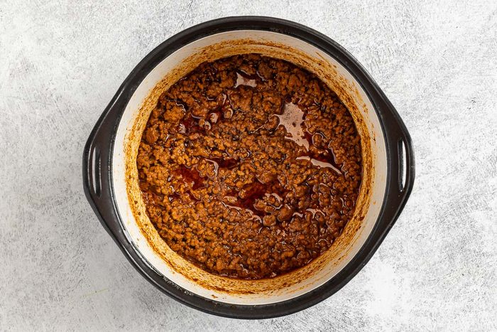 Taste of Home Coney Island Sauce photo of all the ingredients added to the Dutch oven and cooked over low heat for 20 minutes.