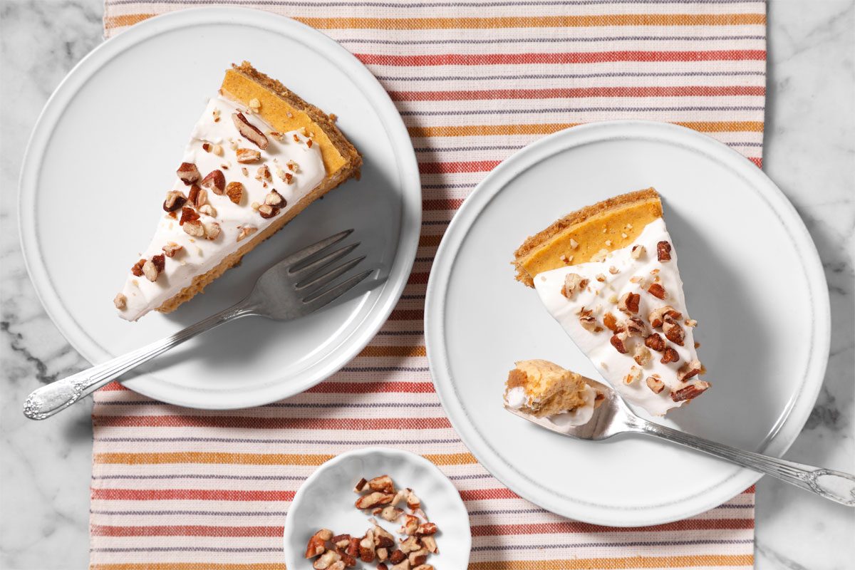 Copycat Cheesecake Factory Pumpkin Cheesecake served on two plates