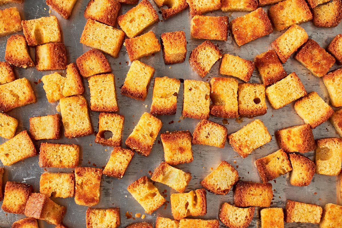 Crunchy, savory cornbread croutons recipe by Taste of Home