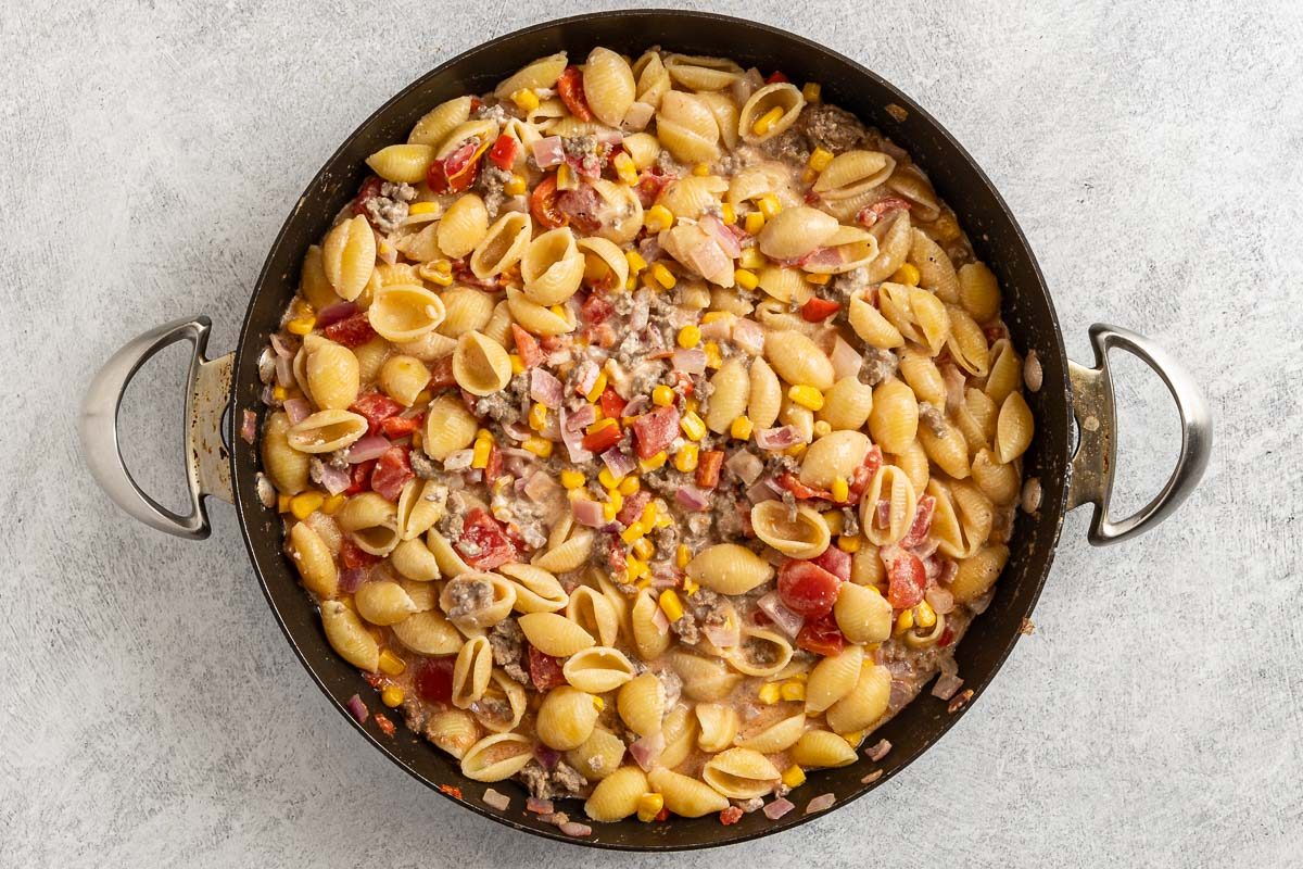 Taste of Home Cowboy Pasta photo of all the ingredients except the Monterey Jack cheese and bacon added to the skillet.