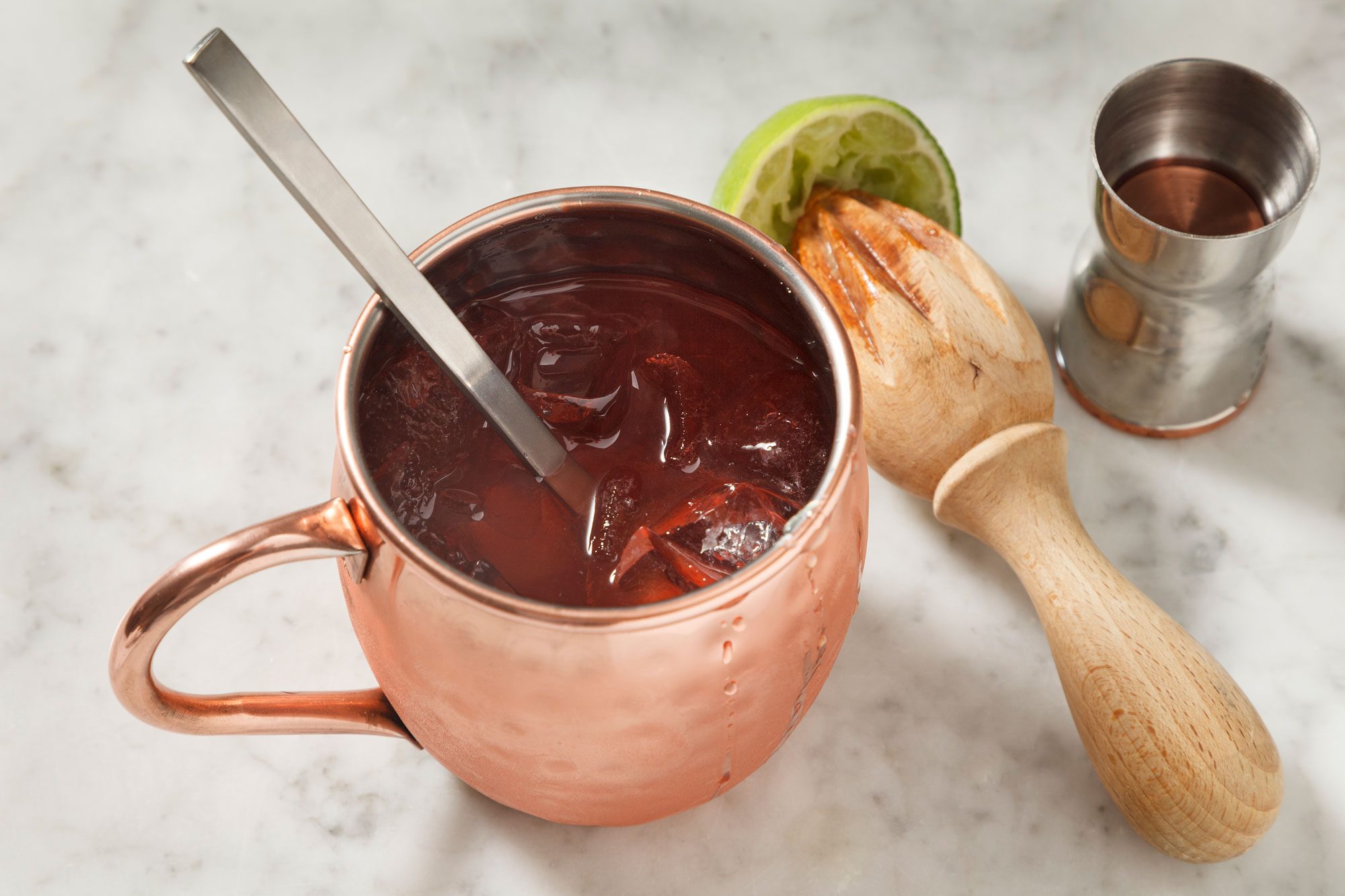 Add cranberry juice and lime juice