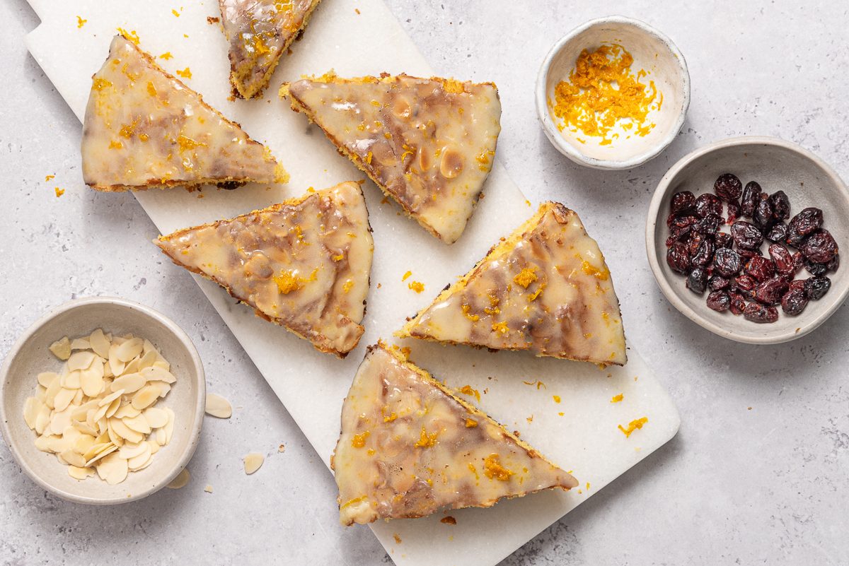 Slices Of Cranberry Orange Cake On Marble Board