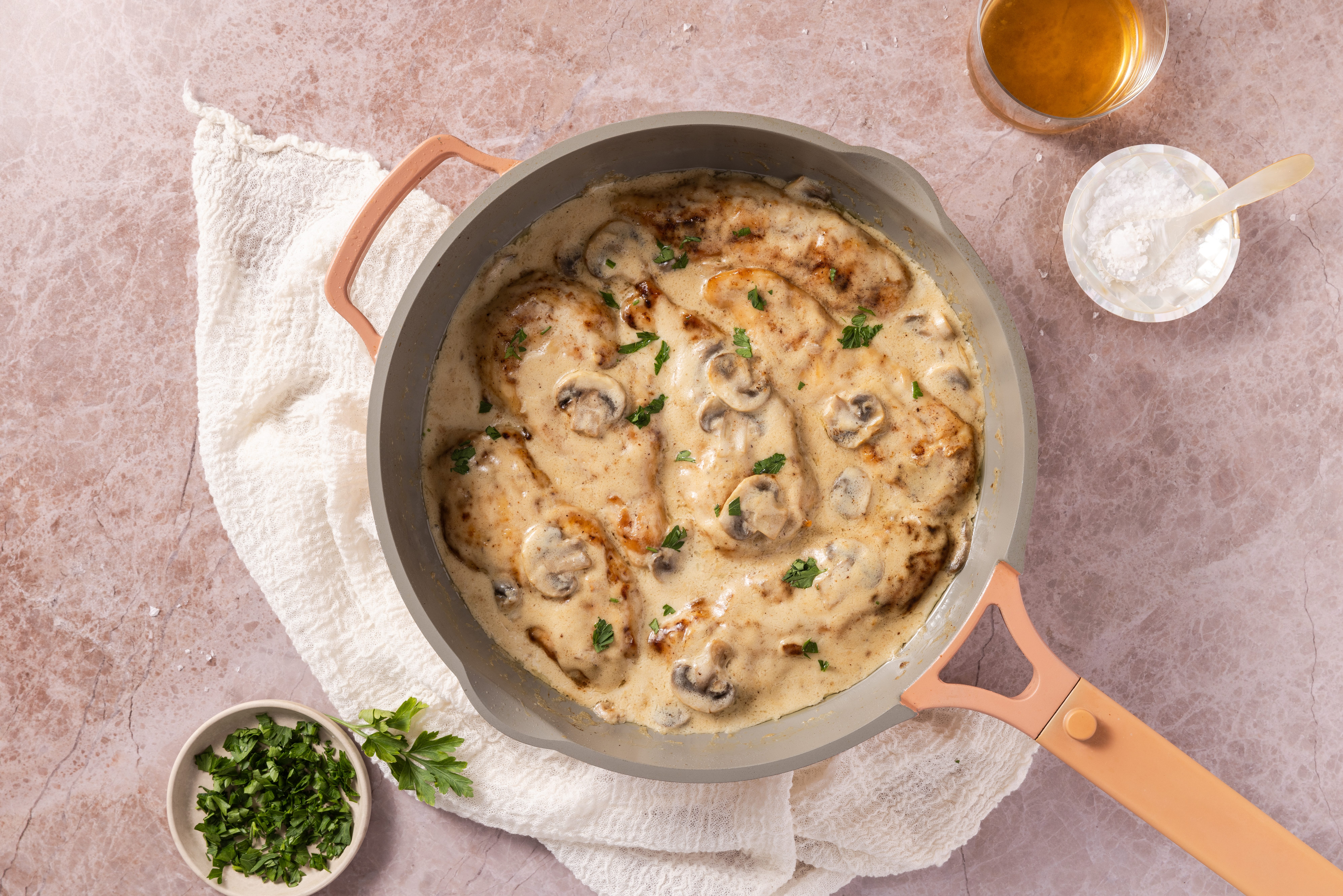 Creamy lemon chicken in skillet, ready to serve.