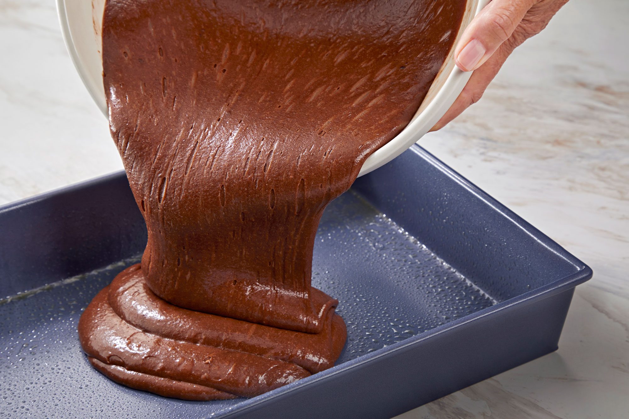 Pour Dairy Free Brownies mixture into a greased 13x9- inch baking pan