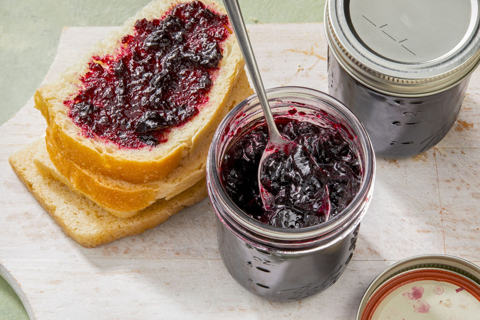 3/4th shot of elderberry jelly in a jar