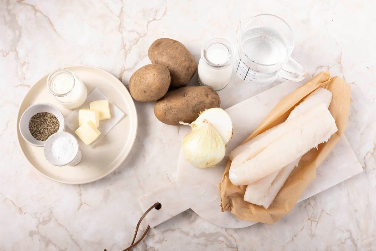 Ingredients for Fish Chowder overhead on marble