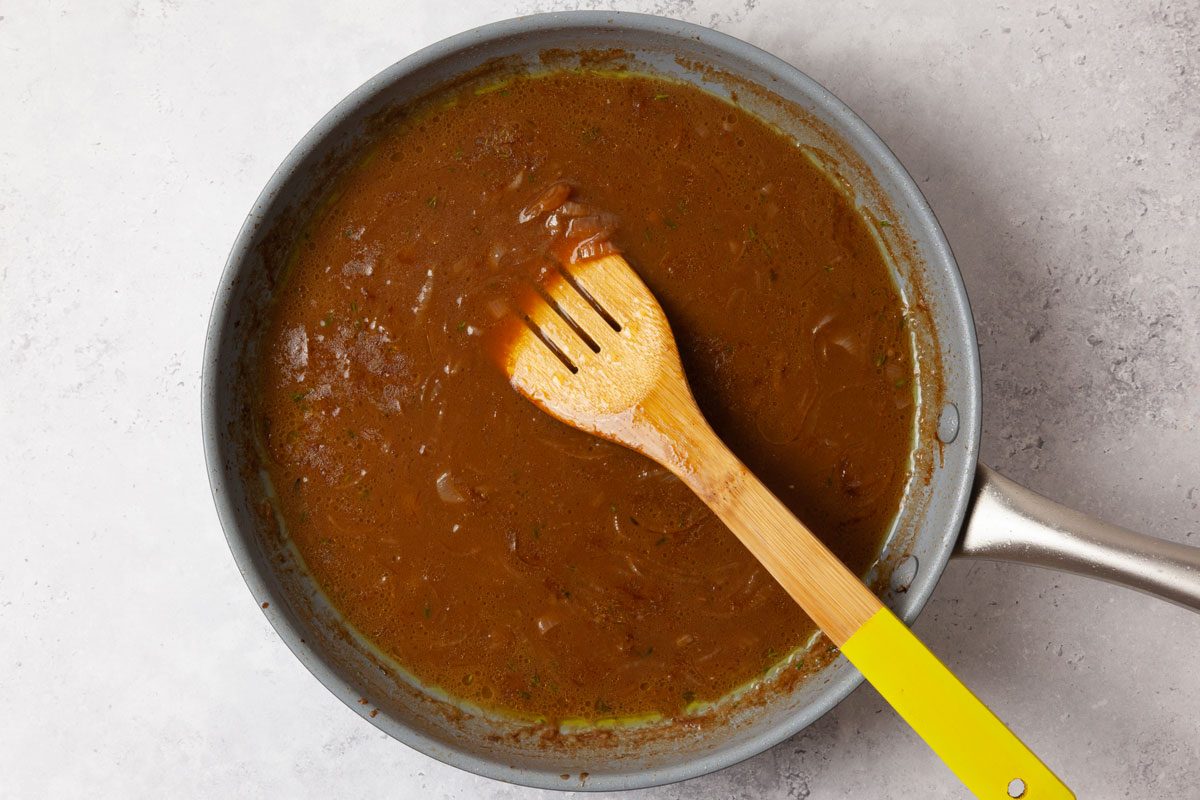 Step 2 of Taste of Home French Onion Meatballs is to Stir in the remaining butter; once melted, whisk in the flour until lightly browned. Slowly whisk in beef stock; bring to a simmer and cook until thickened, 2 to 3 minutes. Remove from heat; set aside.