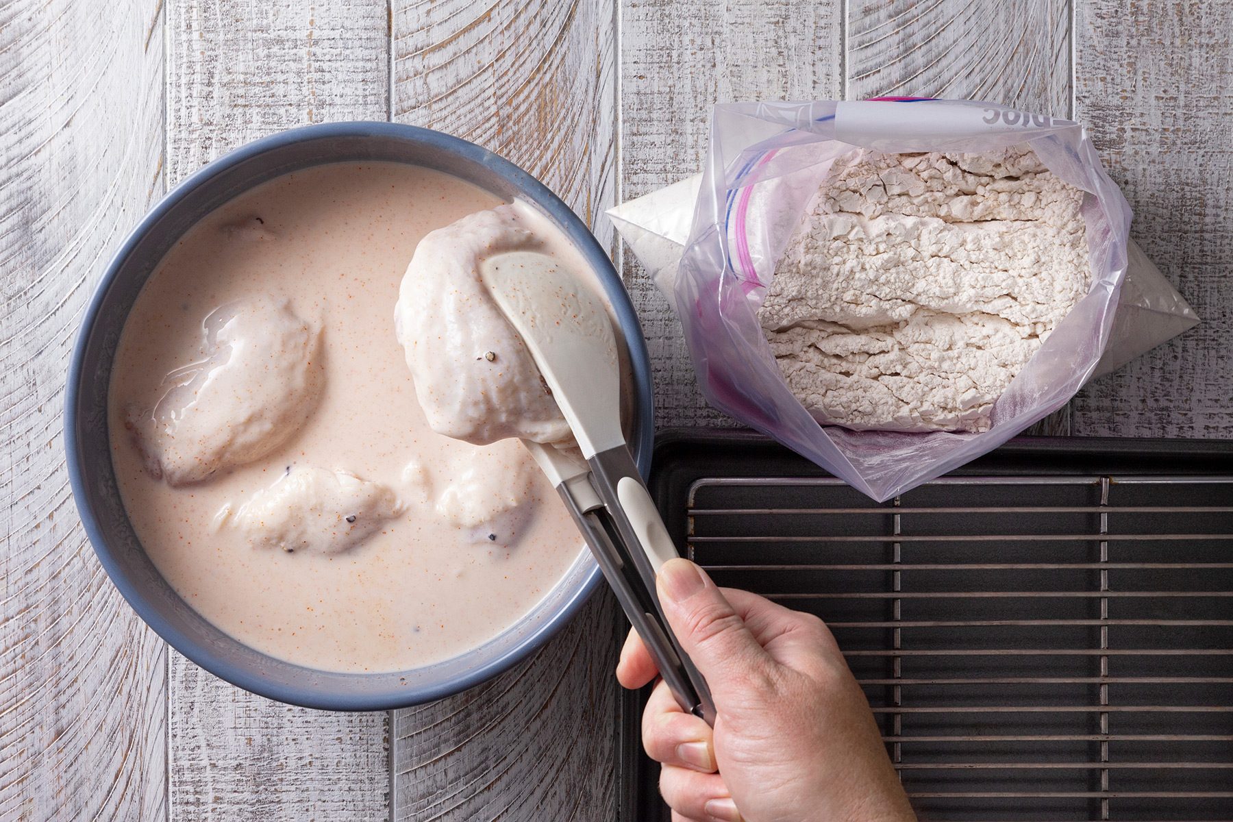 Place chicken thighs in bowl; toss to cover.