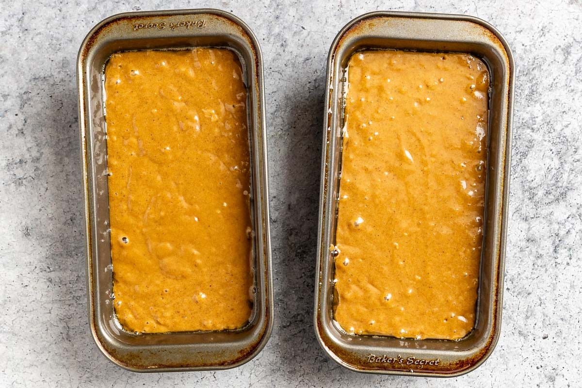 Taste of Home Gingerbread Loaf photo of combining the wet and dry ingredients and pouring the mixture into two loaf pans.