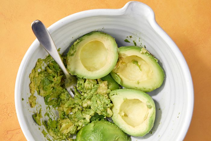 Mashed avocados in a bowl