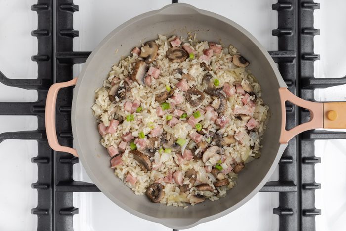 Rice cooked with ham and vegetables, ready to serve.