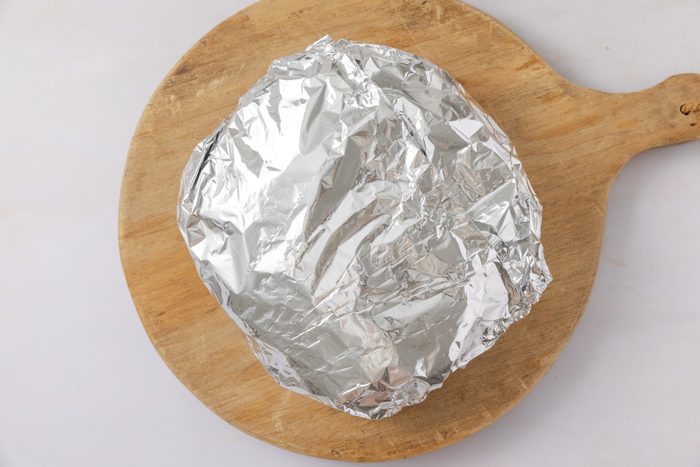 Hawaiian cheese bread wrapped in foil to go in the oven.