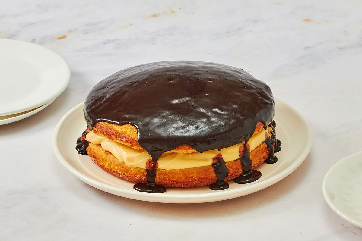 Boston cream pie on a serving plate