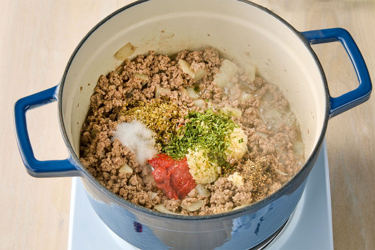 Add Garlic, Tomato Paste, Parsley, Oregano, Salt And Pepper